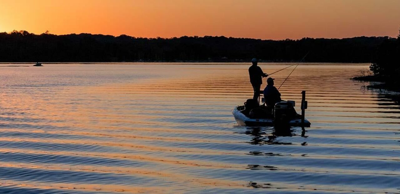 Sunset while someone fishes