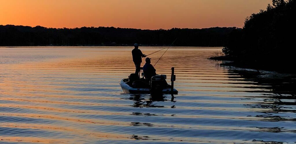 Sunset while someone fishes